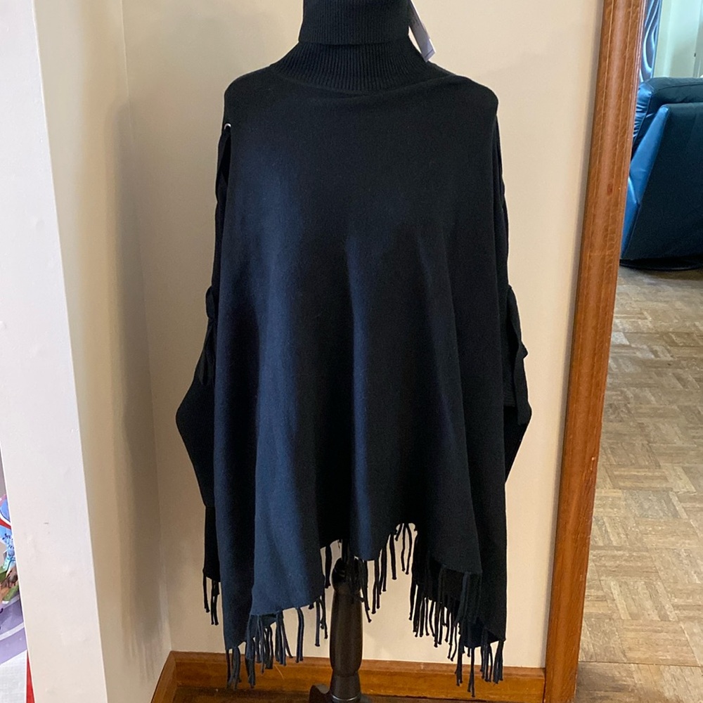 Love Token Black poncho/cape. Size M/L. Fringe bottom. Laced arm. NWT